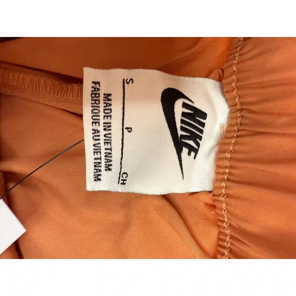 Nike Pleated Womens Loose Fit Mid Rise Woven Pants Monarch Orange Small NEW